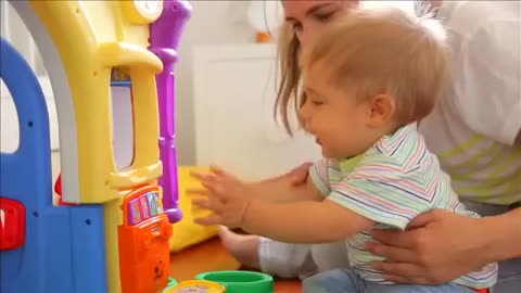 The Fisher-Price Laugh & Learn™ Learning House