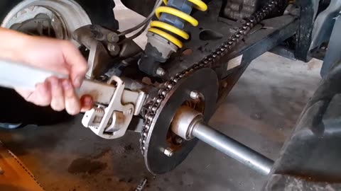 How to Adjust Chain on Polaris 250 Trail Boss