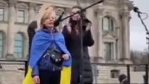 Ukrainian girl singing for the genocide of Russians (in Germany)