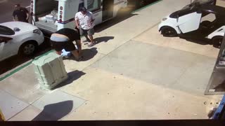 Car Slams into Postal Worker