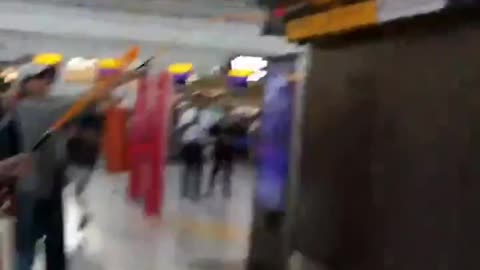 Eco-clowns attack Heathrow Airport, London.