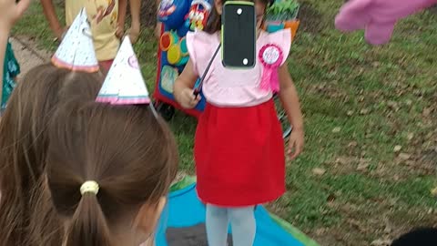 Houston mascot party character Peppa saves grand daddy pigs phone from the pond at smooth stream
