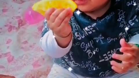 My daughter eating Orange