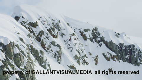 Snowmobile Sends It Off 150 Foot Drop