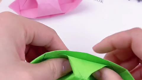 Handmade origami boats are beautiful, small and delicate.