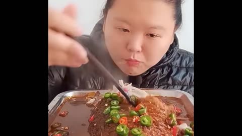 Funny Girl Eating Very Hot Fish