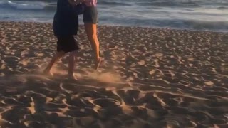 Collab copyright protection - couple on beach failed dirty dancing