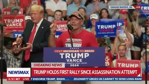 President Trump recognizes a Michigan auto worker in the crowd