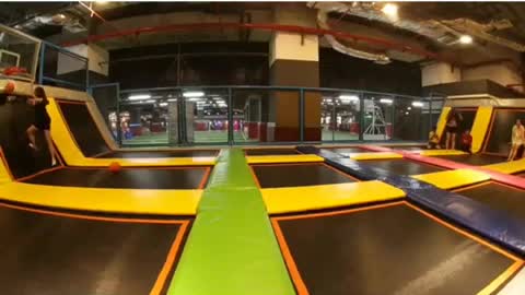 Girl trampoline park basketball face plant into floor