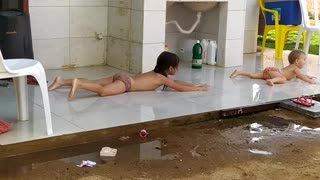 Girl Slides Right Off Slippery Floor