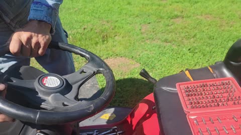 REPAIRING THE STEERING MECHANISM ON THE HUSKEE RIDING LAWN MOWER