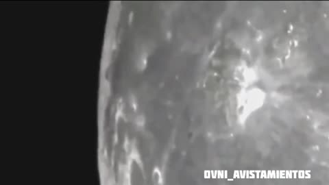 object rising from the moon