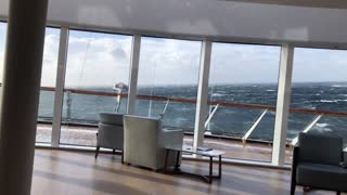 Waves Rock and Pound Cruise Ship off the Coast of Norway