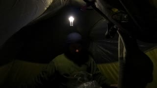 Getting ready for bed in a tent