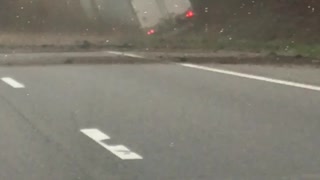 Semi Truck Drifts and Hits Embankment