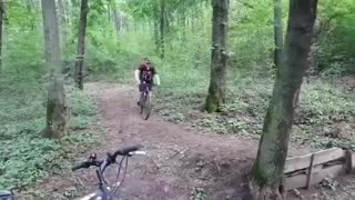 Guy bike mountain small ramp jump fail dirt