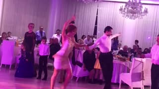 An amazing couple dancing samba on the wedding