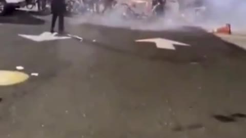 Rioters attack police with fireworks
