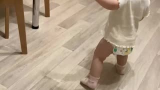 Dizzy Baby Bounces Off Cabinet