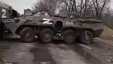Shortly after an ambush. A Russian BTR-80 and 3 trucks captured