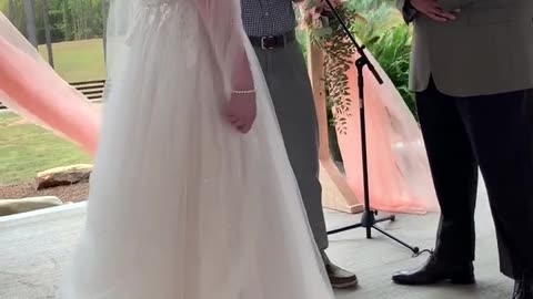 Wedding Ceremony Mishap Flower Arch Collapses on Couple During Their First Kiss