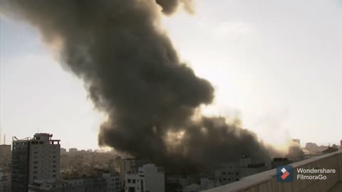 News: media report live in gaza neighbouring building hit by israel airstrike