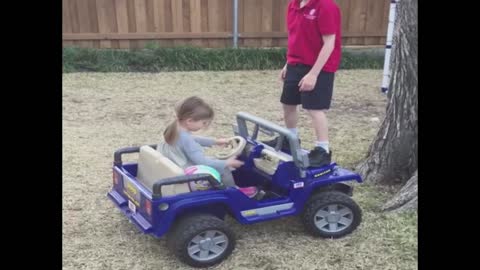 Boy falls off car