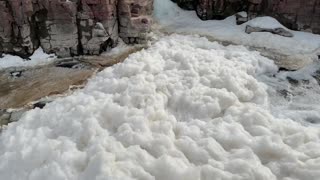 Massive amounts of foam buildup in Big Sioux River