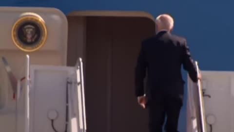American President stumbles and falls over presidential plane