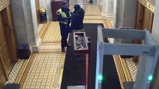 Unseen J6 Footage: Protesters is Uncuffed, Fist Bumps Capitol Police Officer