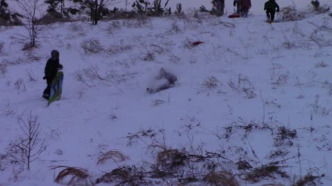 sledding in the snow in the South