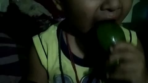 Little champ eating mango first time