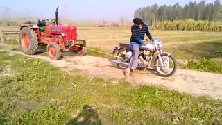 Power of the bullet bike!!!!pull tractor