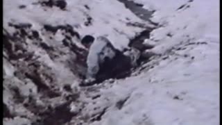 Guy Wipes Out On Sled And Lands In Muddy Ditch