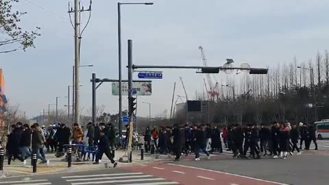 People who are going home from Samsung Semiconductor Plant in Korea.