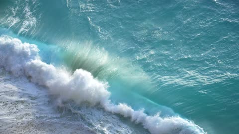Turquoise Wave Crashing on a Beach