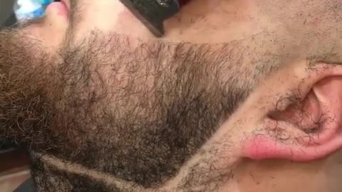 Epic beard transformation by talented barber