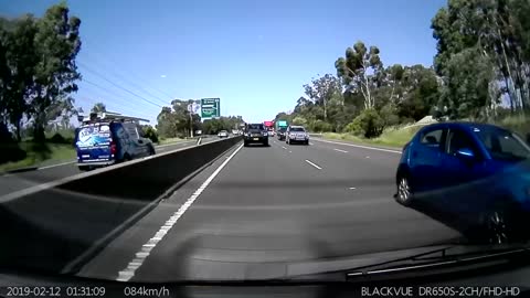 White SUV Flips Over onto Vehicle on Freeway