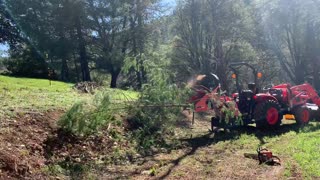 WoodMaxx PTO chipper on Kioti tractor