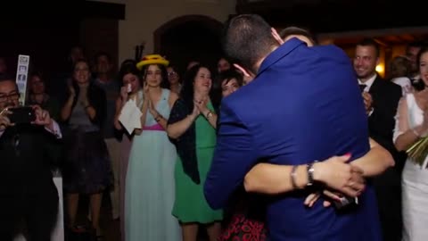 Surprise proposal during bouquet toss at wedding ceremony dance show