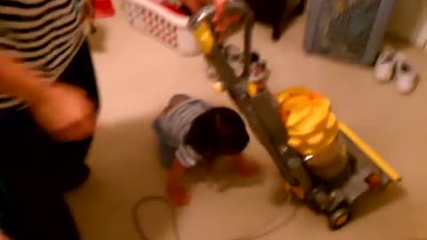 Toddler Has Adorable Tantrum When Her Parents Put The Vacuum Away