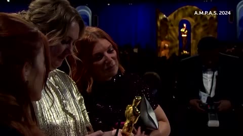 Oscar winners watch as trophies receive their name plates