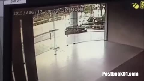 Ghost caught on CCTV breaking glass door in Singapore