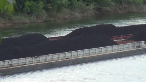 Powerful Tugboat Takes On River