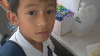 Boy Confused over Chocolate for Teacher