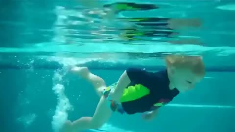 Babies Swimming Under Water