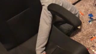 Grandson stuck in chair