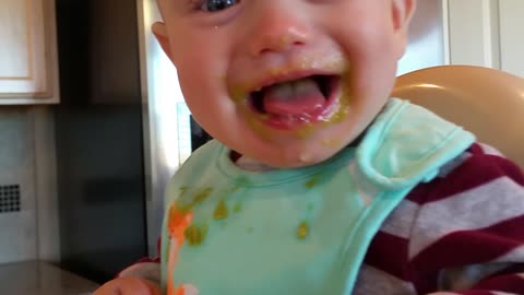 Baby hates green peas but laughs about it