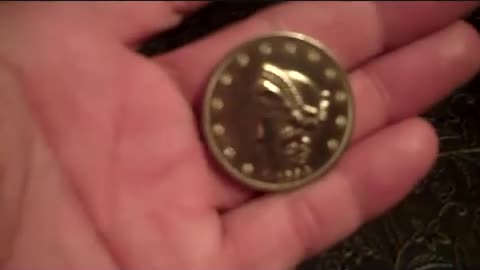 finding a 1854 gold coin in North pole Alaska