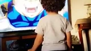 Super excited kid gets fired up for favorite cartoon